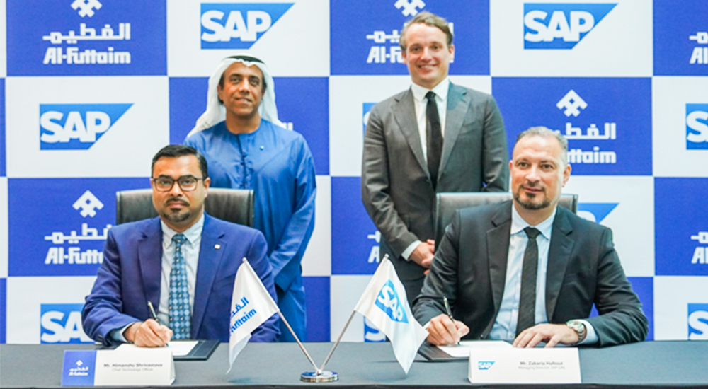 (Left to right) Himanshu Shrivastava, Chief Technology Officer at Al-Futtaim Group, and Zakaria Haltout, Managing Director for SAP UAE, signing the partnership agreement in the presence of Omar Al Futtaim Vice Chairman and CEO of Al-Futtaim Group and Christian Klein, global CEO and Member of the Executive Board of SAP SE.
